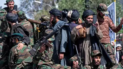 "Representative image of a border checkpoint between Afghanistan and Pakistan with military personnel, highlighting regional security concerns and the Taliban's warning."