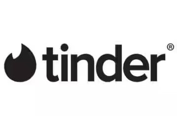 "Smartphone with Tinder app logo displayed, showcasing AI-driven photo optimization feature."
