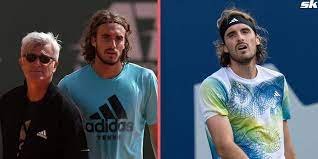 Stefanos Tsitsipas with his father during a tennis match, showcasing their strong bond and partnership in the sport.